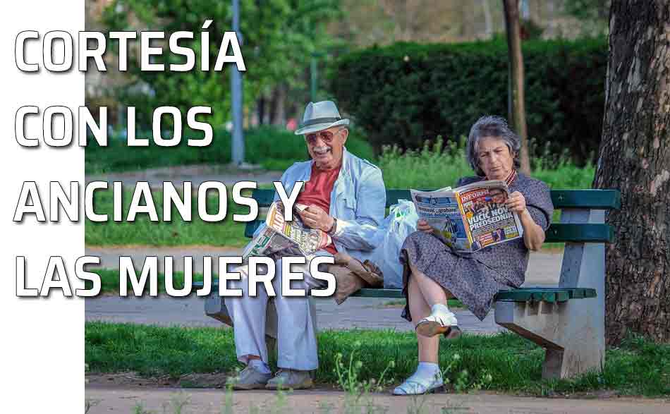 Cortesía con los mayores. Pareja de adultos sentados en un banco